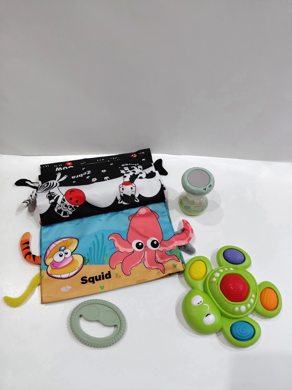 Amazon Pink Squid Play Mat with Green Sensory Turtle & Rattle